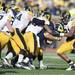 Michigan running back Thomas Rawls is swarmed by Iowa defenders during the third quarter at Michigan Stadium. Melanie Maxwell I AnnArbor.com